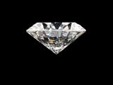 a close up of a diamond on a black background