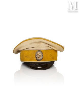 an image of a yellow hat with a gold emblem on it