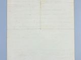 a piece of paper with writing on it sitting on top of a table
