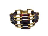 a close up of a bracelet on a white background