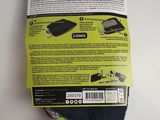 the back of a box of a black and green mouse