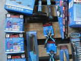 many tools that are sitting on a pallet on the floor