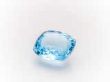 a blue topazte gems on a white background