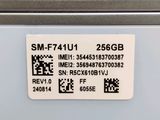 a sticker that says smf7411 on the back of a refrigerator