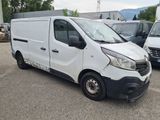 a white van that is parked in a parking lot