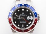 an image of a rolex watch with a red, white and blue bezel