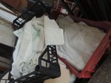a red basket with a white shirt and a black basket with a white shirt