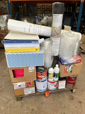 a cart full of supplies and supplies in a warehouse