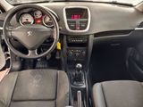 the interior of a car with a steering wheel, dashboard and dashboard controls