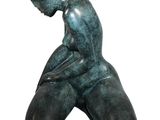 statue of a man kneeling on his knees with his hands on his knees