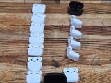 a wooden table with a bunch of white and black items on it