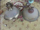 two lamps that are sitting on a table