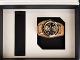 an image of a watch in a display case with a watch on it