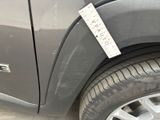 a close up of a car with a sticker on it