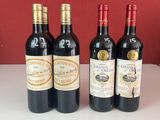 plusieurs bouteilles de vin sont alignées sur un comptoir