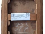 a picture of a piece of wood with a tag on it