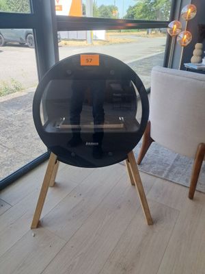 two chairs that are sitting in front of a window