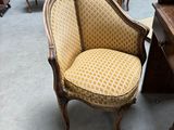 a chair that is sitting in the middle of a room