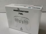 the box of the game controller is sitting on the table