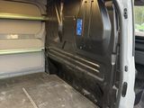 the inside of a van with the door open showing the inside of the van