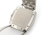 a close up of a wrist watch on a white surface