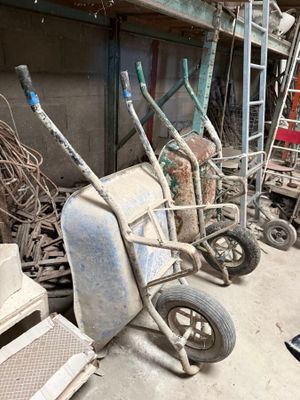 a lot of junk in the garage of a building