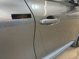 a sticker on the door of a car that has a sticker on it