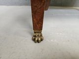an image of a close up of the legs of a wooden table