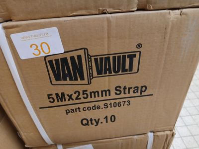 a cardboard box that is sitting on top of a pile of boxes