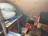 a pile of luggage sitting on the floor in a room