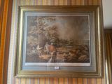 une photo d'un tableau accroché au mur
