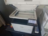 a printer that is sitting on top of a desk