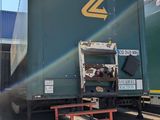 a truck that is parked in front of a building