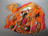 une image représentant un chapeau orange sur lequel figure le portrait d'une femme