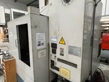 a machine that is sitting inside of a building