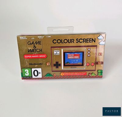 une image représentant une console de jeux Nintendo dans son emballage, posée sur une surface blanche