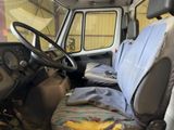 an image of a van with a seat cover on