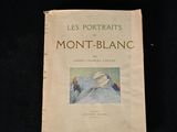 un vieux livre avec une image de montagne en arrière-plan