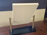 a picture of a desk with a mirror on top of it