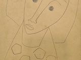 drawing of a woman with a hat and a scarf on a piece of paper