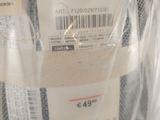 a bag of luggage that is wrapped up and ready to be packed