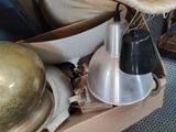 a box with a lamp, a bowl, and a bowl on top of it