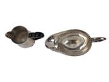 pair of antique silver plated teapots with black handles
