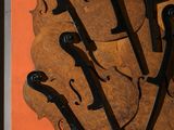 a picture of a picture of a violin made out of wood