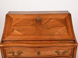 a small wooden desk with a drawer on top of it