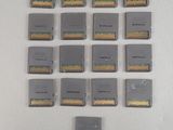a lot of memory cards arranged on a white surface