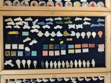 a picture of a display case with a lot of magnets on it