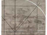une photo d'un tapis orné d'un motif circulaire