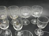 a lot of empty wine glasses sitting on a table