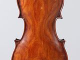 an antique violin with a wooden case and bow